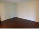 Clean bedroom featuring hardwood flooring and ample natural light at 9926 Turf Way # 8, Orlando, FL 32837