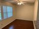 Bright dining room features gleaming hardwood floors and natural lighting at 9926 Turf Way # 8, Orlando, FL 32837