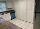 Well-maintained kitchen boasts ample storage and stainless steel refrigerator at 9926 Turf Way # 8, Orlando, FL 32837