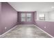 Cozy bedroom with two windows, ample natural light, and neutral paint at 997 La Mirada Ct, Kissimmee, FL 34744