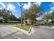 Gated community entrance of Lago Vista with manicured landscaping and serene atmosphere at 997 La Mirada Ct, Kissimmee, FL 34744