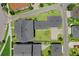 Expansive aerial view showcases the layout of a large home with fenced yard and driveway in a well-maintained neighborhood at 1071 Kershaw Dr, Winter Garden, FL 34787