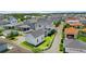 Neighborhood aerial view showcasing a well-maintained two-story home with a fenced yard, set within a beautifully planned community at 1071 Kershaw Dr, Winter Garden, FL 34787