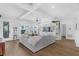 Spacious living room with a large sectional sofa and built-in shelving at 1071 Kershaw Dr, Winter Garden, FL 34787