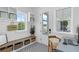 Bright mudroom features shiplap walls, storage, and patterned tile flooring, providing a stylish and functional space at 1071 Kershaw Dr, Winter Garden, FL 34787