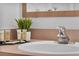 Close-up of a bathroom sink featuring modern fixtures and complimentary toiletries, adding to its appeal at 1084 Park Ridge Cir, Kissimmee, FL 34746