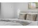 Comfortable bedroom features decorative pillows and a plush comforter on the bed at 1084 Park Ridge Cir, Kissimmee, FL 34746