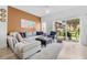 Comfortable living room with modern furniture, lots of sunlight and view to the patio at 1084 Park Ridge Cir, Kissimmee, FL 34746