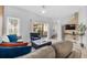 Cozy living area features contemporary furnishings and lots of natural light at 1084 Park Ridge Cir, Kissimmee, FL 34746