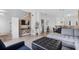 Open-concept living space featuring modern furnishings and lots of natural light at 1084 Park Ridge Cir, Kissimmee, FL 34746