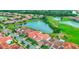 Community features well-maintained homes, golf course, and multiple lakes with scenic views at 13125 Alderley Dr, Orlando, FL 32832