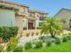 Attractive two-story house featuring manicured landscaping, a tile roof, and inviting curb appeal at 13125 Alderley Dr, Orlando, FL 32832