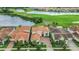 Stunning two-story home boasts a beautiful tile roof, well-manicured lawn, and gorgeous landscaping at 13125 Alderley Dr, Orlando, FL 32832