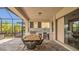 Outdoor kitchen with stainless steel appliances, a grill, and bar seating for entertaining at 13125 Alderley Dr, Orlando, FL 32832