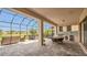Outdoor patio featuring a hot tub, outdoor kitchen and dining area, and comfortable seating at 13125 Alderley Dr, Orlando, FL 32832
