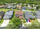 An aerial view of homes with well-maintained lawns in a suburban neighborhood at 14883 Hartford Run Dr, Orlando, FL 32828