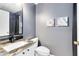 Stylish bathroom showcasing a modern vanity, patterned countertop and contemporary fixtures at 14883 Hartford Run Dr, Orlando, FL 32828