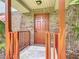 Inviting front entrance with a classic door, brick exterior, and a cozy porch area at 1591 Revere Ln, Daytona Beach, FL 32117