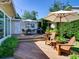 Spacious deck features outdoor seating, a grill, and lush landscaping, perfect for entertaining and enjoying the outdoors at 1791 Spruce Ave, Winter Park, FL 32789