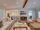 Inviting living room featuring hardwood floors, neutral colors, and an open layout with a kitchen at 1791 Spruce Ave, Winter Park, FL 32789