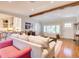 Cozy living room boasts hardwood floors, natural light, and an open layout with an eat-in kitchen at 1791 Spruce Ave, Winter Park, FL 32789