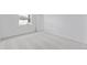 Spacious bedroom with carpet, natural light from the window, and a neutral color scheme at 2026 Firethorn Loop, Haines City, FL 33844