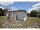 Exterior view of the home with fencing in the backyard at 2041 Swanson Dr, Deltona, FL 32738