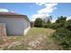View of the home's backyard and side of the house at 2041 Swanson Dr, Deltona, FL 32738