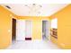 Bright bedroom with tile flooring and multiple doorways for easy access to other rooms at 2041 Swanson Dr, Deltona, FL 32738
