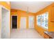 Bright dining area with neutral color scheme and natural light, perfect for hosting gatherings at 2041 Swanson Dr, Deltona, FL 32738