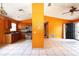 Open kitchen with wooden cabinets, stainless steel oven and plenty of room for table at 2041 Swanson Dr, Deltona, FL 32738