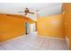 Bright living room with tile floors, high ceilings, and neutral paint ready for customization at 2041 Swanson Dr, Deltona, FL 32738