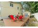Backyard with an outdoor patio featuring chairs and a firepit, perfect for enjoying outdoor entertaining at 2223 Amherst Ave, Orlando, FL 32804