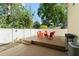 Outdoor patio with chairs and a grill creating a backyard setting for entertaining at 2223 Amherst Ave, Orlando, FL 32804