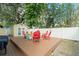 A welcoming backyard featuring a patio with comfortable seating and a cozy fire pit, ideal for outdoor gatherings at 2223 Amherst Ave, Orlando, FL 32804