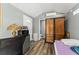 Cozy room featuring hardwood floors, ample storage, and natural light at 2223 Amherst Ave, Orlando, FL 32804