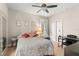 Comfortable bedroom with soft carpet, natural light, and simple decor at 2223 Amherst Ave, Orlando, FL 32804