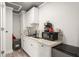 A well-equipped kitchenette featuring modern appliances, ample counter space, and stylish backsplash for functionality at 2223 Amherst Ave, Orlando, FL 32804