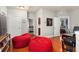 Spacious living room with hardwood floors, access to multiple rooms, and natural light at 2223 Amherst Ave, Orlando, FL 32804