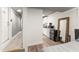 Cozy studio apartment featuring a kitchenette and a full size mirror at 2223 Amherst Ave, Orlando, FL 32804