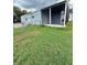 A large backyard featuring a patio and fence for privacy at 2711 Cranmoor Dr, Kissimmee, FL 34758
