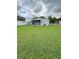 A expansive backyard, perfect for relaxing or entertaining outdoors at 2711 Cranmoor Dr, Kissimmee, FL 34758