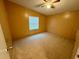 Bedroom with neutral walls, plush carpeting and natural light at 2711 Cranmoor Dr, Kissimmee, FL 34758