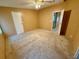 Bedroom with ceiling fan, neutral walls, carpeted flooring and closet at 2711 Cranmoor Dr, Kissimmee, FL 34758