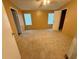 Bright bedroom featuring plush carpeting and natural light at 2711 Cranmoor Dr, Kissimmee, FL 34758