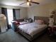 Bright bedroom featuring 2 beds, ample lighting, and neutral colors at 2818 Sheila Dr, Apopka, FL 32712
