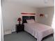 Simple bedroom with carpeted floors and minimal decor at 2818 Sheila Dr, Apopka, FL 32712