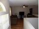 Cozy living room featuring hardwood floors, a comfortable sofa, and a ceiling fan at 2818 Sheila Dr, Apopka, FL 32712