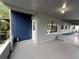 Exterior view with painted blue brick, neutral grey siding and convenient covered carport at 2829 Sanford Ave, Sanford, FL 32773