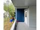 View of the front porch area, featuring brick accent wall and direct access to the house at 2829 Sanford Ave, Sanford, FL 32773